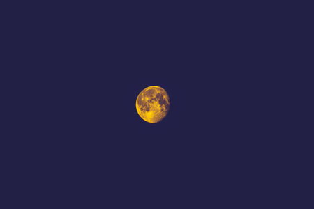 The Moon has an unusual gold colourの写真素材