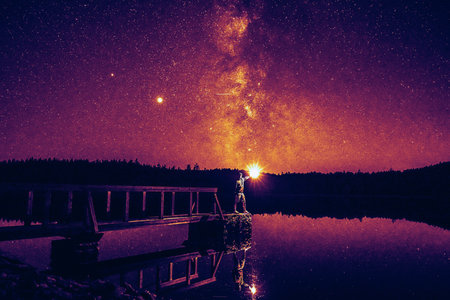 the abstract scene, a man with a lamp looking into spaceの写真素材