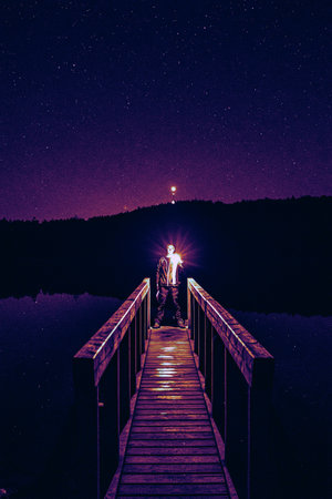 the abstract art, photo at night, guy with lightの写真素材