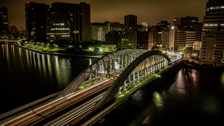A vibrant long-exposure shot of a bridge in Tokyo, Japanの写真素材