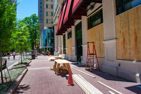 Charlotte NC/USA-06 01 2020: George Floyd protester's last night damaged some businesses in uptown Charlotte's financial district. Some business are preparing for another possible nighte protests.のeditorial素材