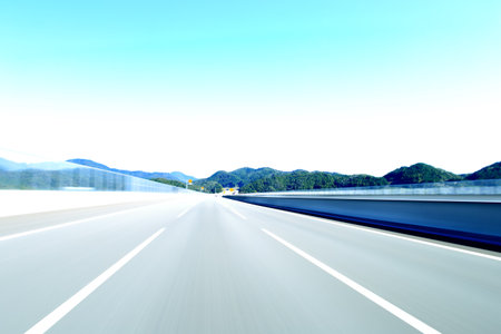 Car driving on highway, motion blur