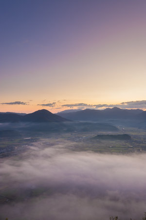 Sea of ââclouds and mountains from the summitの写真素材