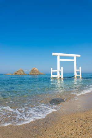 White arch on the sandy beach near the sea. Summer landscape.の写真素材