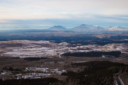 View of the snow-capped mountains and the valley in the winterの写真素材
