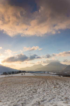 Beautiful winter landscape in the mountains at sunsetの写真素材