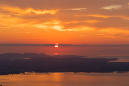 Sunrise over Beppu City, Oita Prefecture, Japanの写真素材