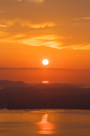 Sunrise over Beppu City, Oita Prefecture, Japanの写真素材