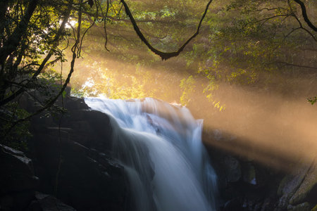 Waterfall and rays of light