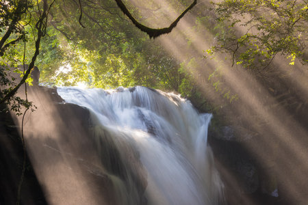 Waterfall and rays of light