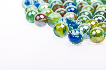 Soft abstract image of colourful marbles on white background with copy space.の写真素材