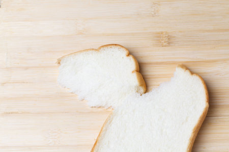 Slice of white bread isolated on white background.の写真素材