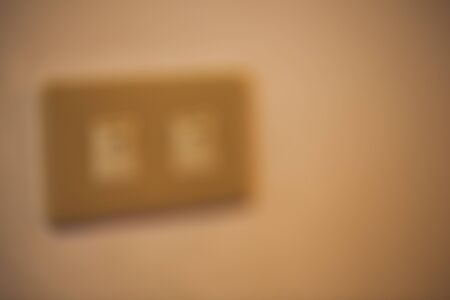 Abstract front device panel with detailed red power switch buttonの写真素材