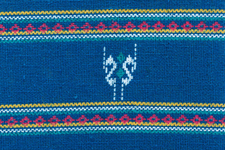 A collection of Thai silk. Colourful pattern of Thai silk . Blue color Thai style fabric background.