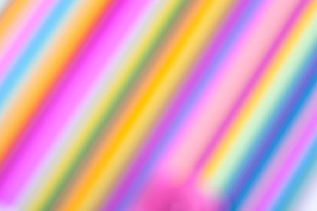 Abstract blur colourful papers background. Rainbow colored paper close upの写真素材