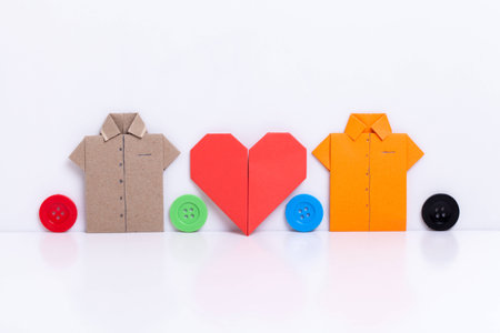 colour paper origami. Paper origami shirts and heart isolated on white background.