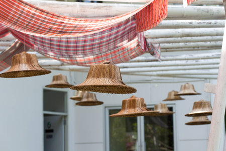 Palm leaf hats show in garden.の写真素材