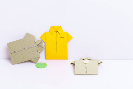 colour paper origami. Paper origami shirts and heart isolated on white background.の写真素材