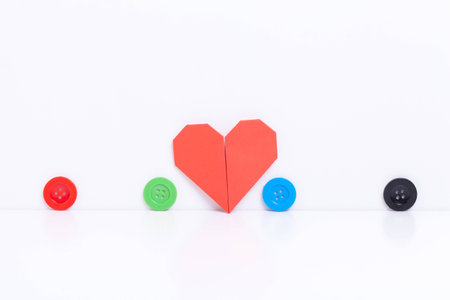 colour paper origami. Paper origami heart isolated on white background.の写真素材