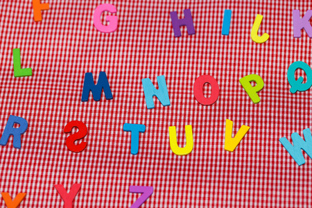 color wood of letter on white background.の写真素材