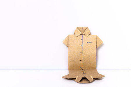 Japanese paper origami shirts on white background, can use for background.の写真素材