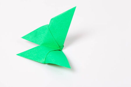 colourful origami butterfly paper on withe background.の写真素材