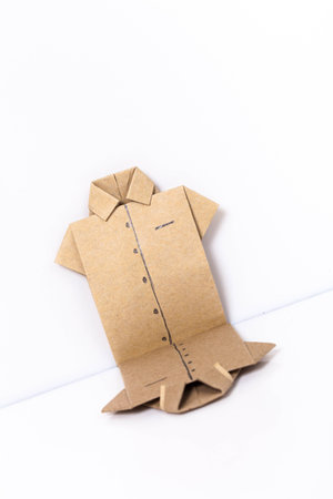 Japanese paper origami shirts on white background, can use for background.の写真素材