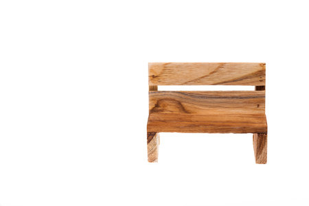 Close-up of small wooden chairs.の写真素材