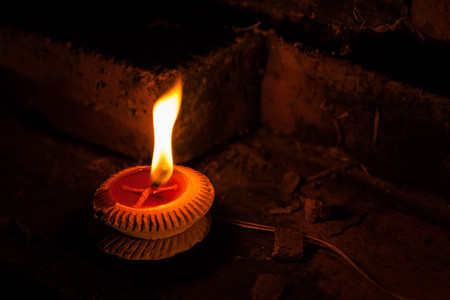 candle light on brick wall.の写真素材