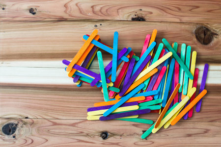 colorful ice cream stick on wood background.の写真素材