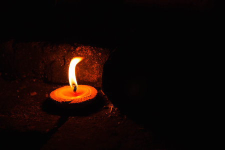candle light on brick wall.
