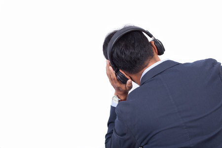 A man use headphone listening music.