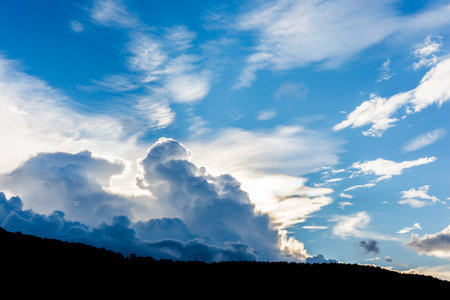 Dark and white cloud in blue sky after raining.