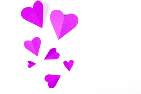 Origami paper heart purple color on white background.の写真素材