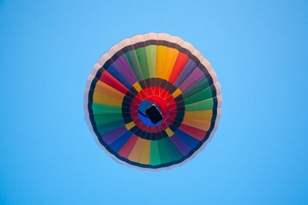 Colorful hot air balloon fly over the blue skyの写真素材