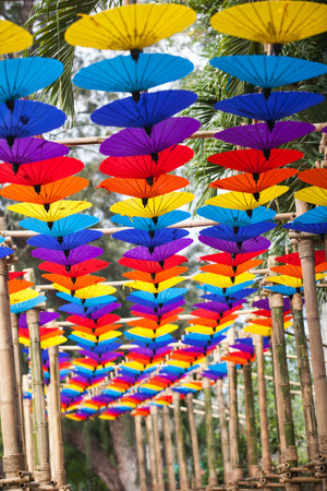 Colorful umbrellas background. Street decoration in Chiangmai flower festival 2018.の写真素材