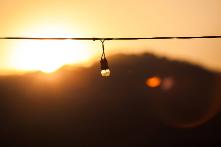 A small lamp outdoor with sunset backgroun.dの写真素材