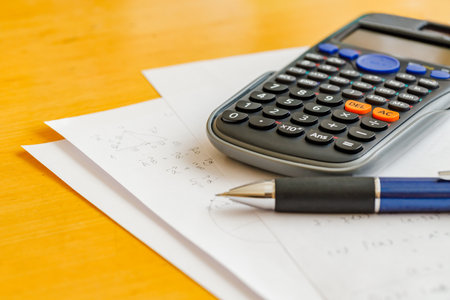 Math problems and pen and calculator