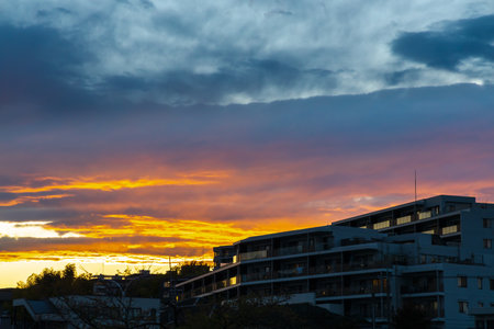 Sunset in a red-colored residential areaの写真素材