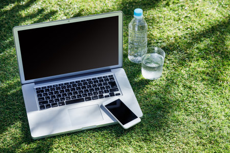 Lawn and laptop
Remote work imageの写真素材