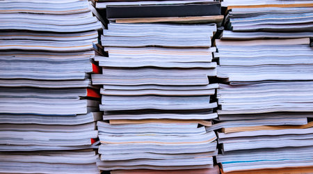 a lot of old books stackedの写真素材