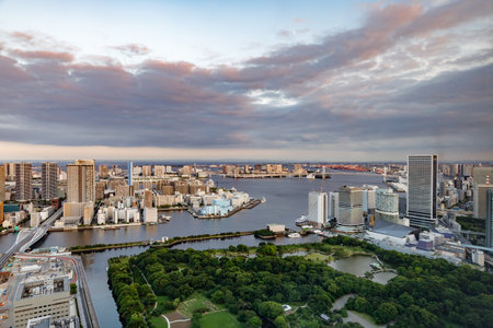Buildings and sunset skies on the water's edge of Tokyo