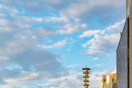 Blue Sky, Clouds and Towers