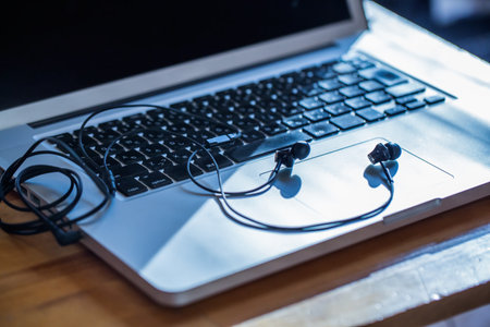 Earphones and computersの写真素材