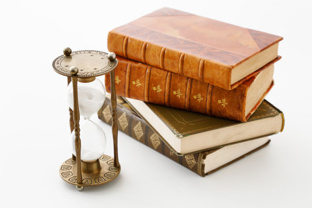 Antique books and hourglassの写真素材