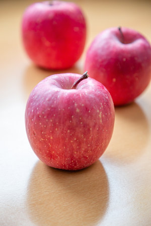 A lot of bright red apples