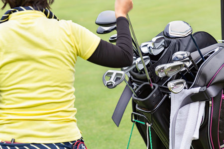 A woman who enjoys playing golfの写真素材
