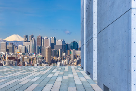 Concrete walls, blue sky and cloudsの写真素材