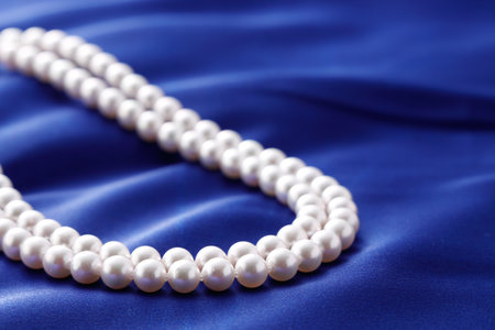 Pearl Necklace with blue satin.の写真素材