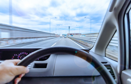 The city's rooftops seen from the driver's seatの写真素材